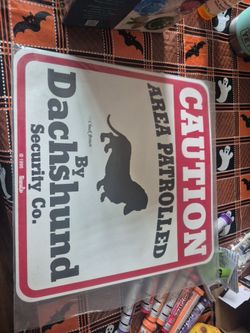 Caution Dachshund Area Patrolled Sign