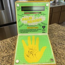 Palm reader coin machine