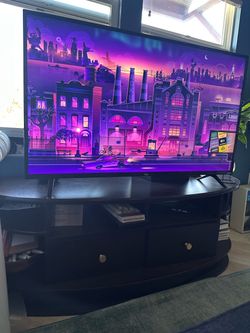 Tv stand -dark brown wood with rounded corners