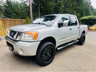 2012 Nissan Titan Crew Cab SL Pickup 4D 5 1/2 ft 4x4 – Super Clean! 	●	Clean title 	●	168,000 miles 	●	Leather interior 	●	Sunroof 	●	Power rear windo