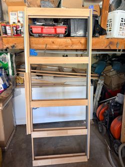 Two pocket door frames and two primed solid wood pocket doors. Selling for $575 each pair
