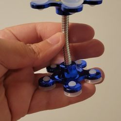 brand new silicone double sided phone holder available color blue . white and gold $5 each 