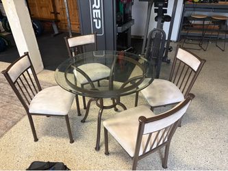 Round glass table; 4 chairs