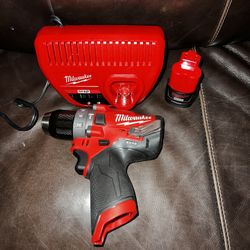 Brand New Milwaukee M12 Hammer Drill Fuel With Battery And Charger 