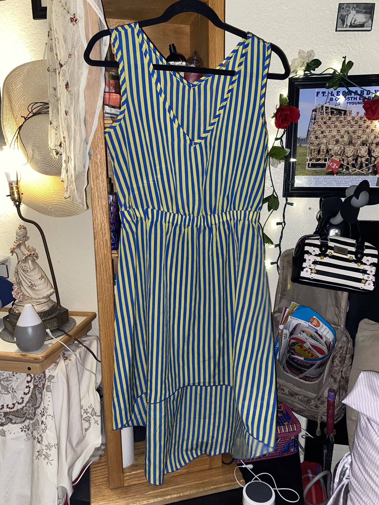 Preowned woman’s size M yellow/blue dress in great condition but a bit see through located off lake mead and jones area asking $3
