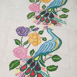 Handmade boho chic decorative cushion cover hand-embroidered in natural fiber fabrics.