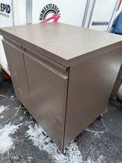 Metal cabinet on wheels