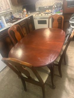 Table with glass and chairs