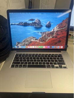 macbook pro 15” i7 16 Gb memory 512 flash ssd