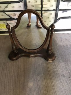 Antique makeup mirror.