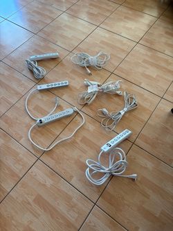 7 ASSORTED SURGE PROTECTORS AND EXTENSION CORDS