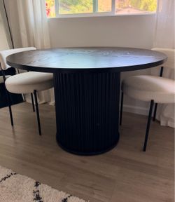 Round Black Wood Dining Table with Fluted Pedestal Base