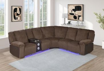 Channel tufted Brown 3 Pc Power reclining Sectional w/speaker & console