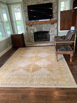 Oushak-style rug and rug pad