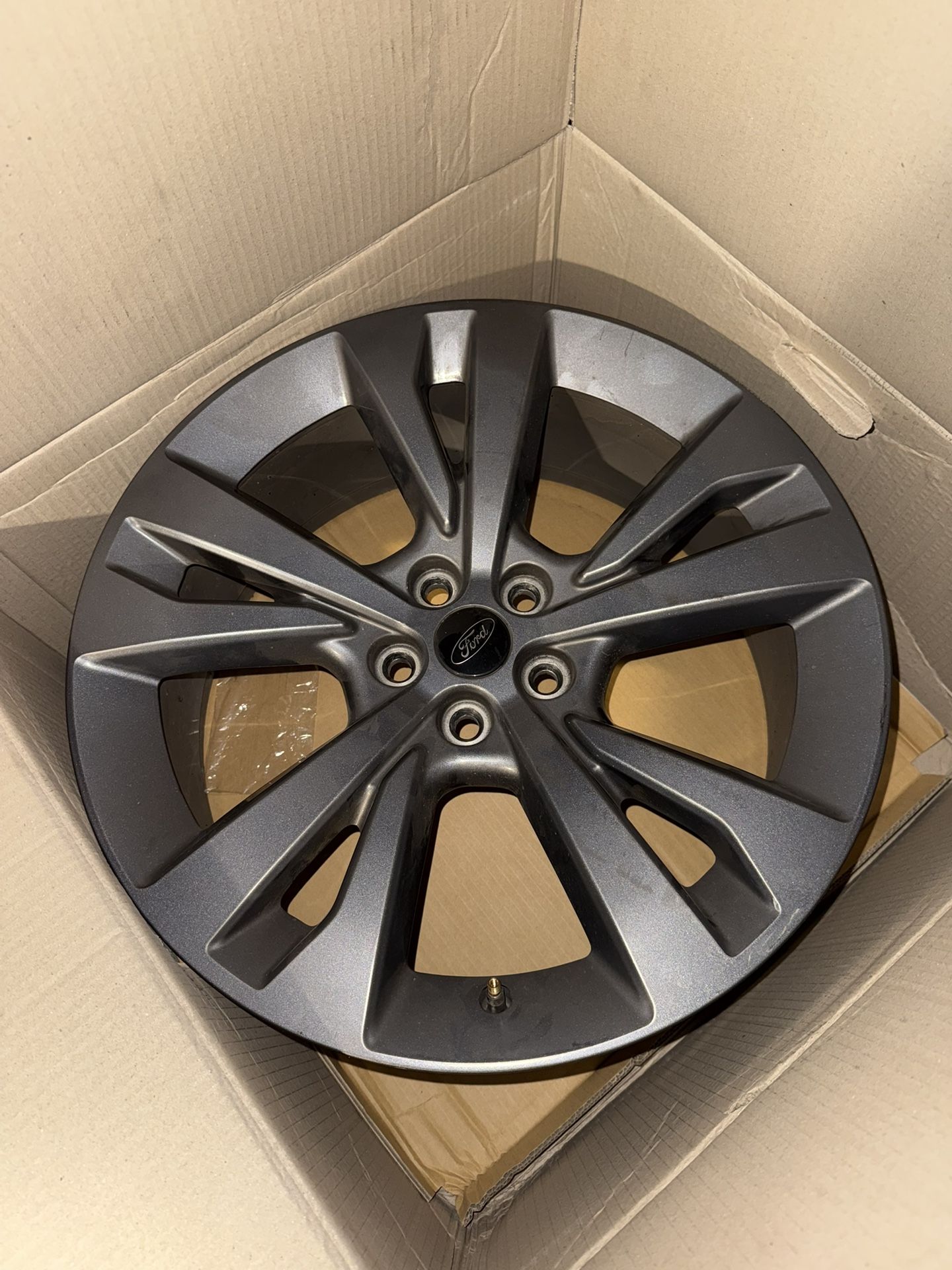 20-inch alloy factory wheel for a Ford Explorer.