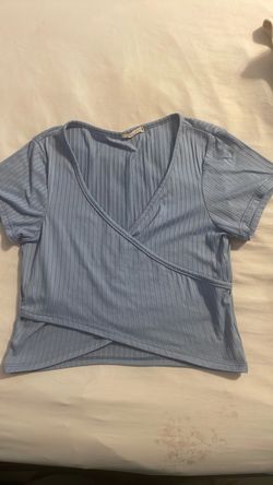 Light blue cross over shirt