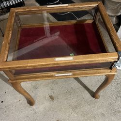 Glass wooden  upright display case. Item is perfect for a shop owner 
