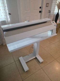 Miele Rotary Iron, likely model B990 or a similar B-series unit designed for professional-level results at home