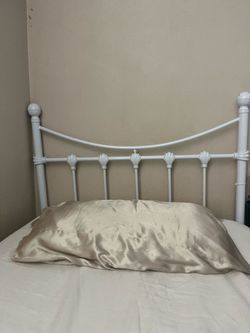 White twin metal headboard