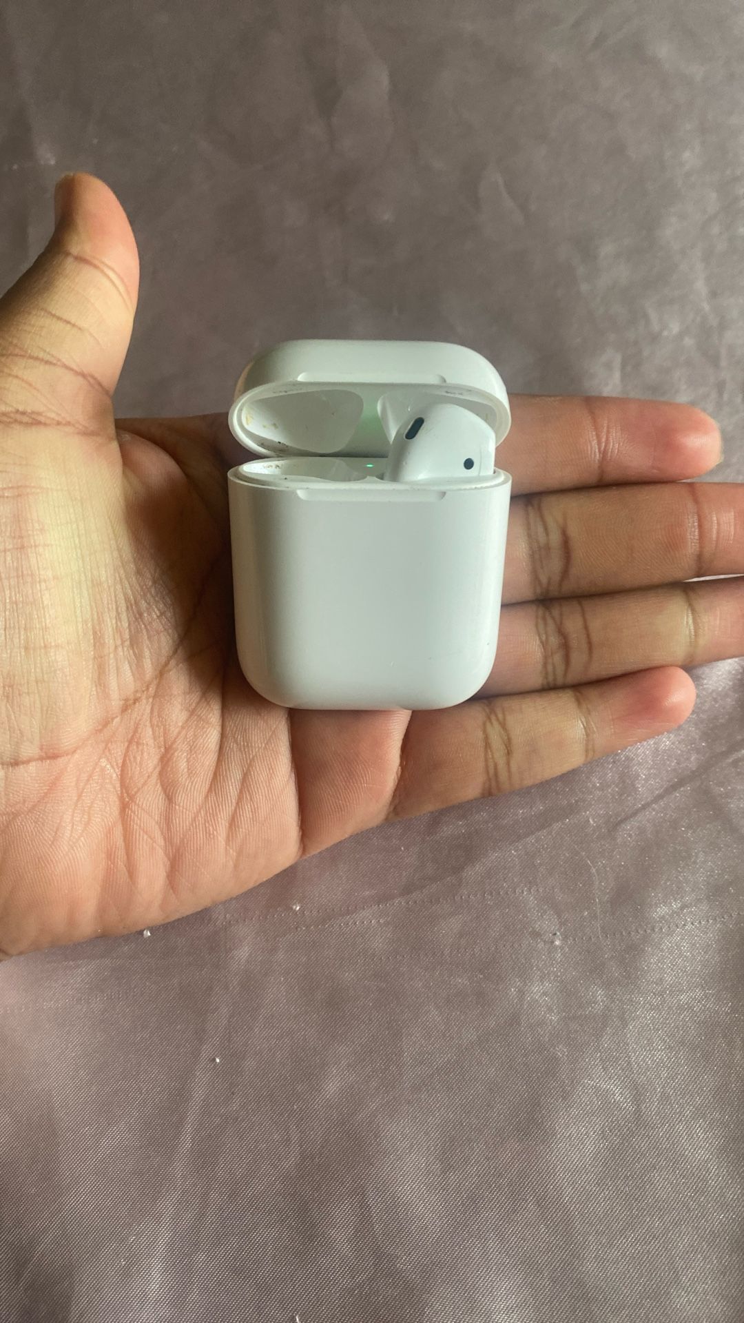 Airpod Generation Two right AirPod and case
