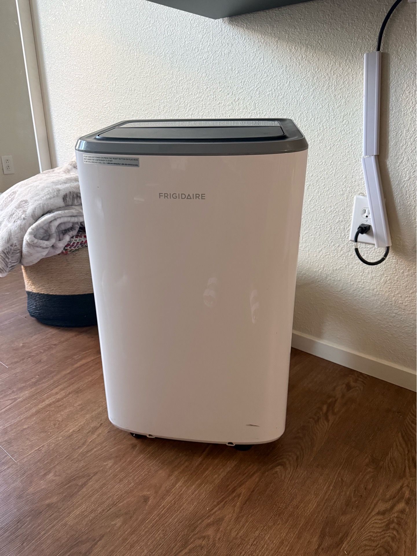 Portable air conditioner with plug in cord