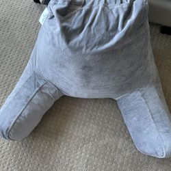 Memory Foam Pillow Sitting In Bed 