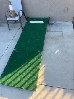 Baseball pitching mound and net
