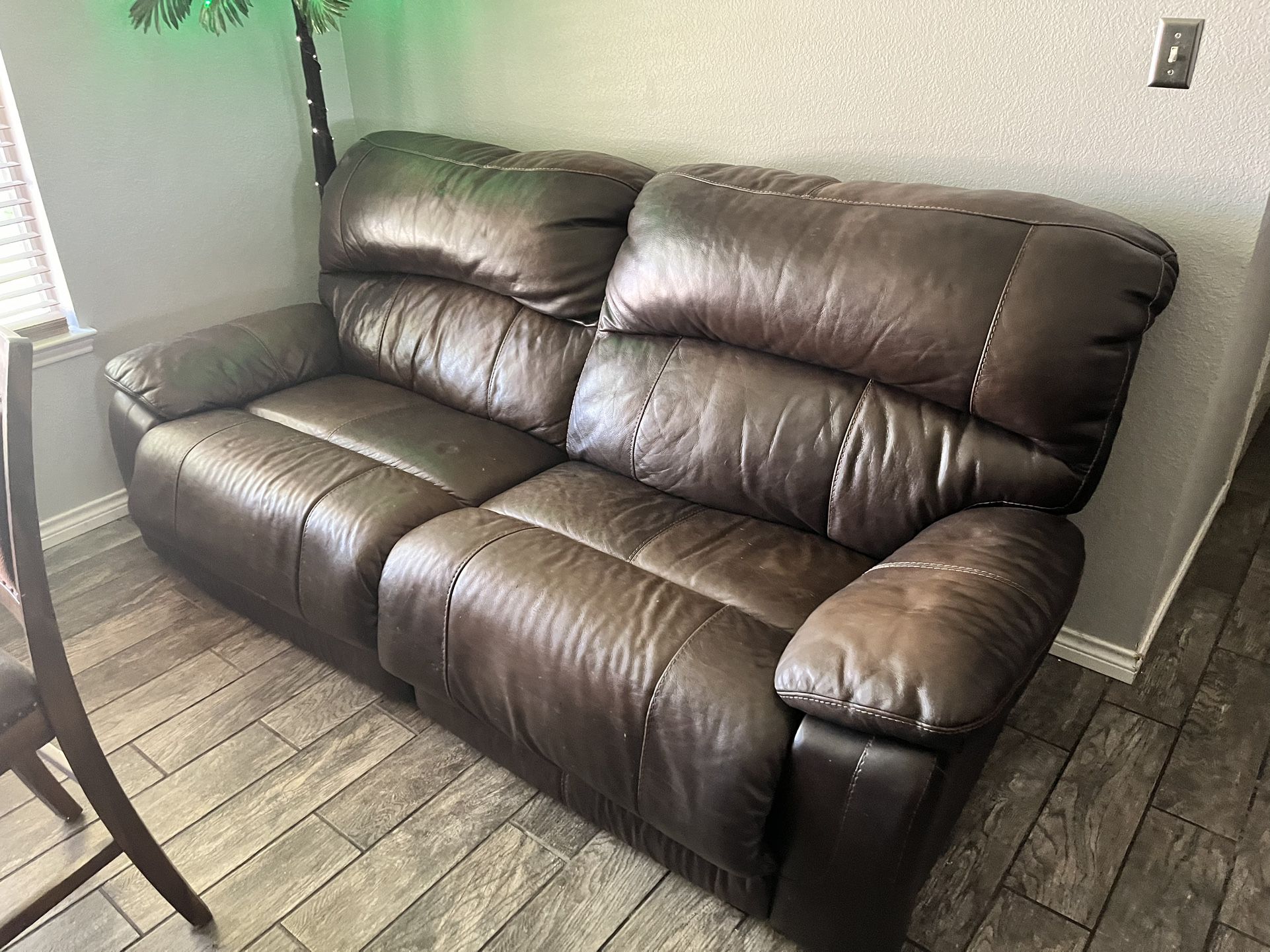 Large Reclining leather couch and chair Combo