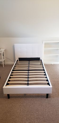Twin size bed frame in white fabric
