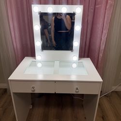 Vanity table with mirror