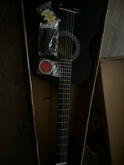 Black Classical guitar with soft case and extra strings and strap and pitch pipe (NEED IT GONE FAST)