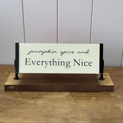 Rotating sign on table shelf decor