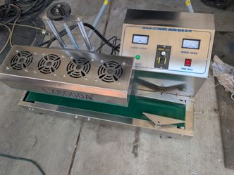 Continuous Electromagnetic induction sealing machine