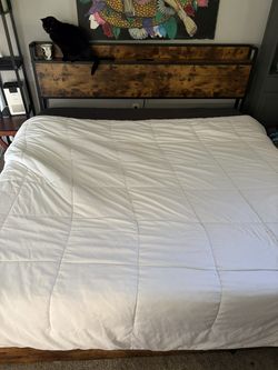 King size bed frame with power outlet and storage