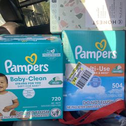 2 Boxes Of Size 2 Pampers And 3 Boxes Of Wipes 