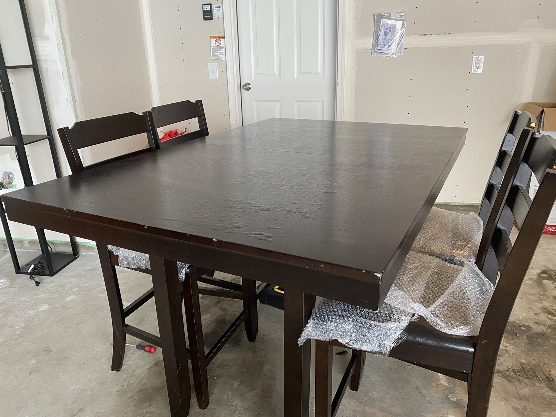Dark Brown Dining Table (4 chairs) with extended leaf and bottom storage shelving