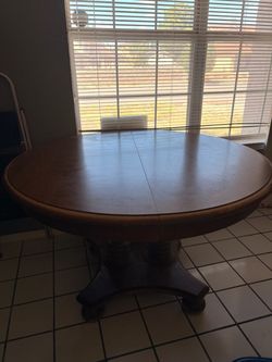 Ethan Allen round solid wood table
