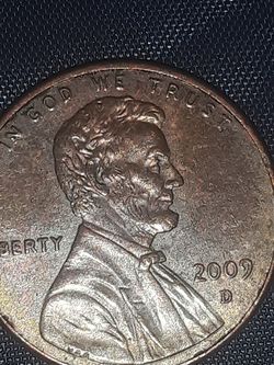 2009 Lincoln penny error en mano