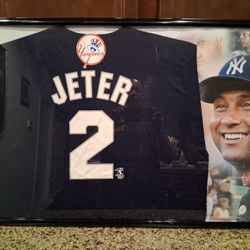 DEREK JETER HALL OF FAMER WITH THE NEW YORK YANKEES STITCHED,BRANDED AUTHENTIC FRAMED JERSEY.