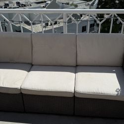 Patio Set - Couch, One Chair And A Coffee Table 