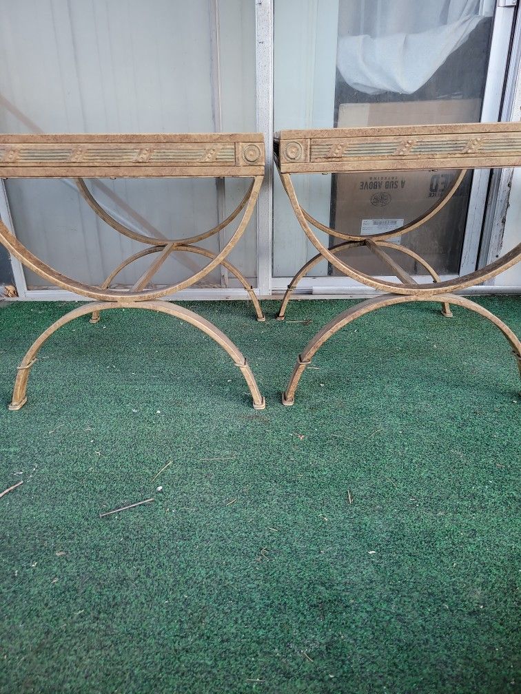 Antique tables with Ornate metal.