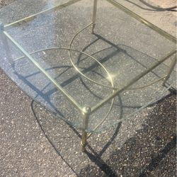 Glass and brass coffee table 