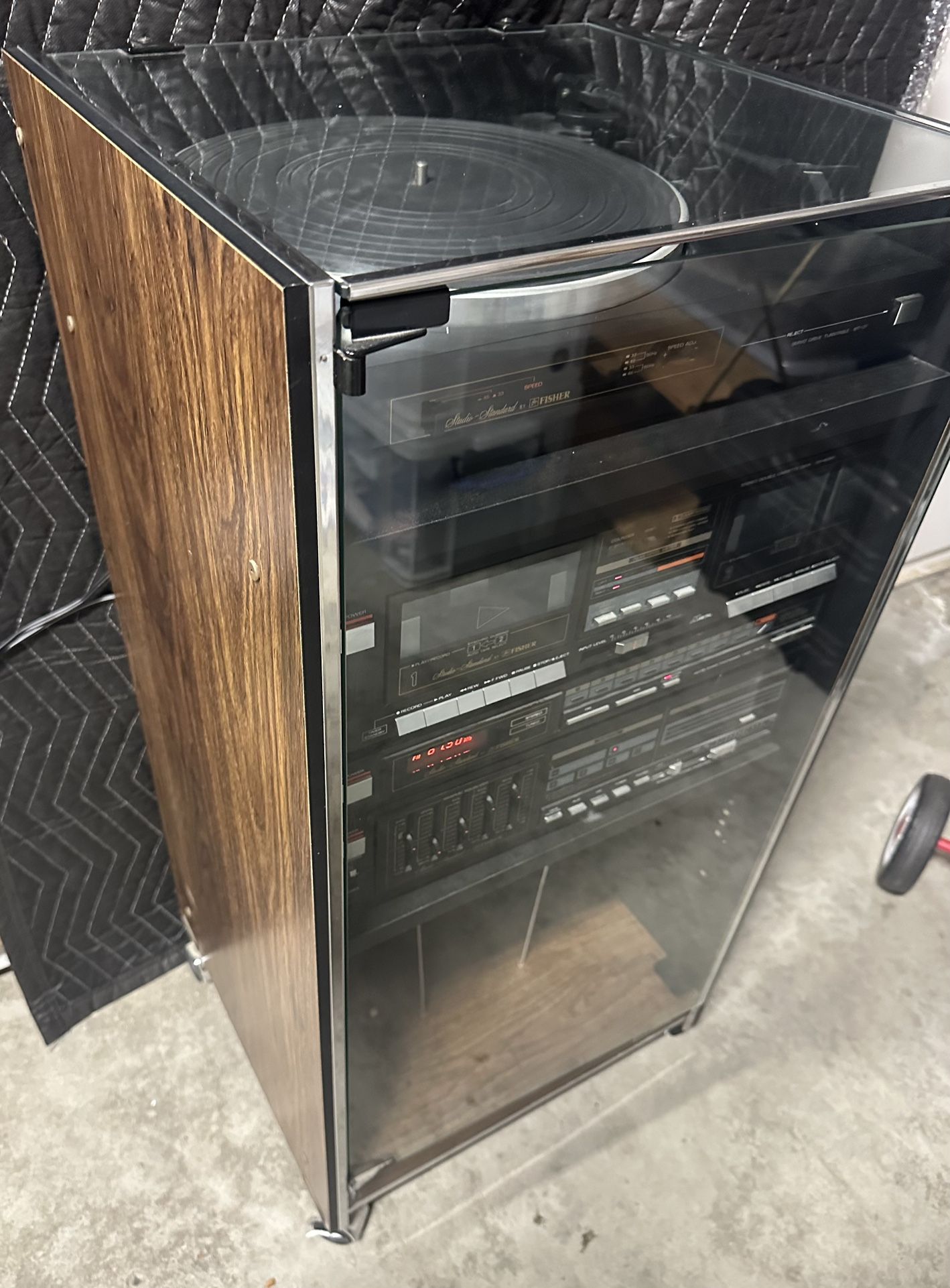 Vintage Fisher Stereo System With Glass Cabinet .  It all powers on fine, No Speakers,  All in Beautiful Condition 