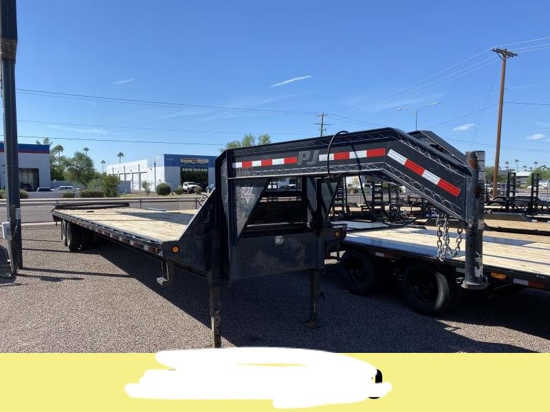 2014 PJ TRAILERS 102X40 FLATBED TRAILER