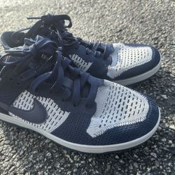 Nike Dunk Low Flyknit sneakers in the College Navy and Pure Platinum