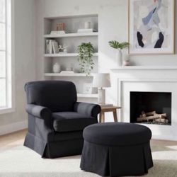 Plush Black Armchair And Ottoman