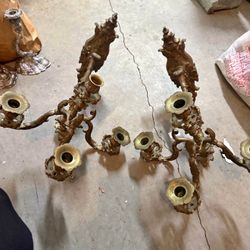 pair of antique bronze wall sconces.