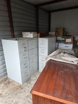 2 Office desks 6. Four drawer file cabinets