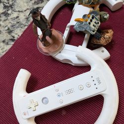 Nintendo Wii controller with racing wheels Skylanders toys 