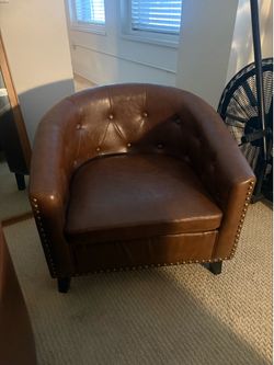 Faux leather barrel chairs